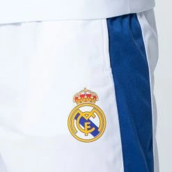 Real Madrid CF Real Madrid Trainingspak 21/22 - Voetbaltrainingspak Voor Heren - Officieel Real Madrid Fanproduct - Vest En Trainingsbroek - 100% Polyester - Maat XXL -Sportkleding-Dames Winkel 550x550 225